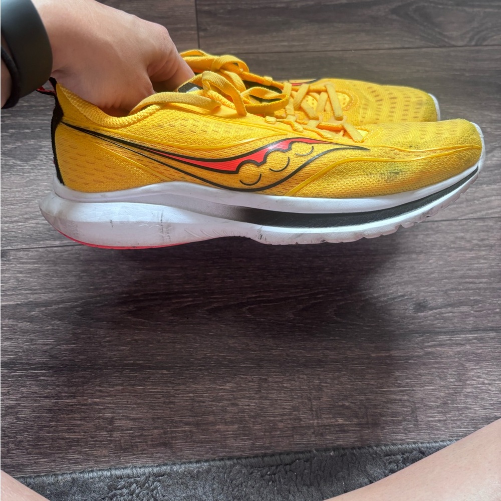 Saucony Yellow Running Sneakers with Red and Black Logo